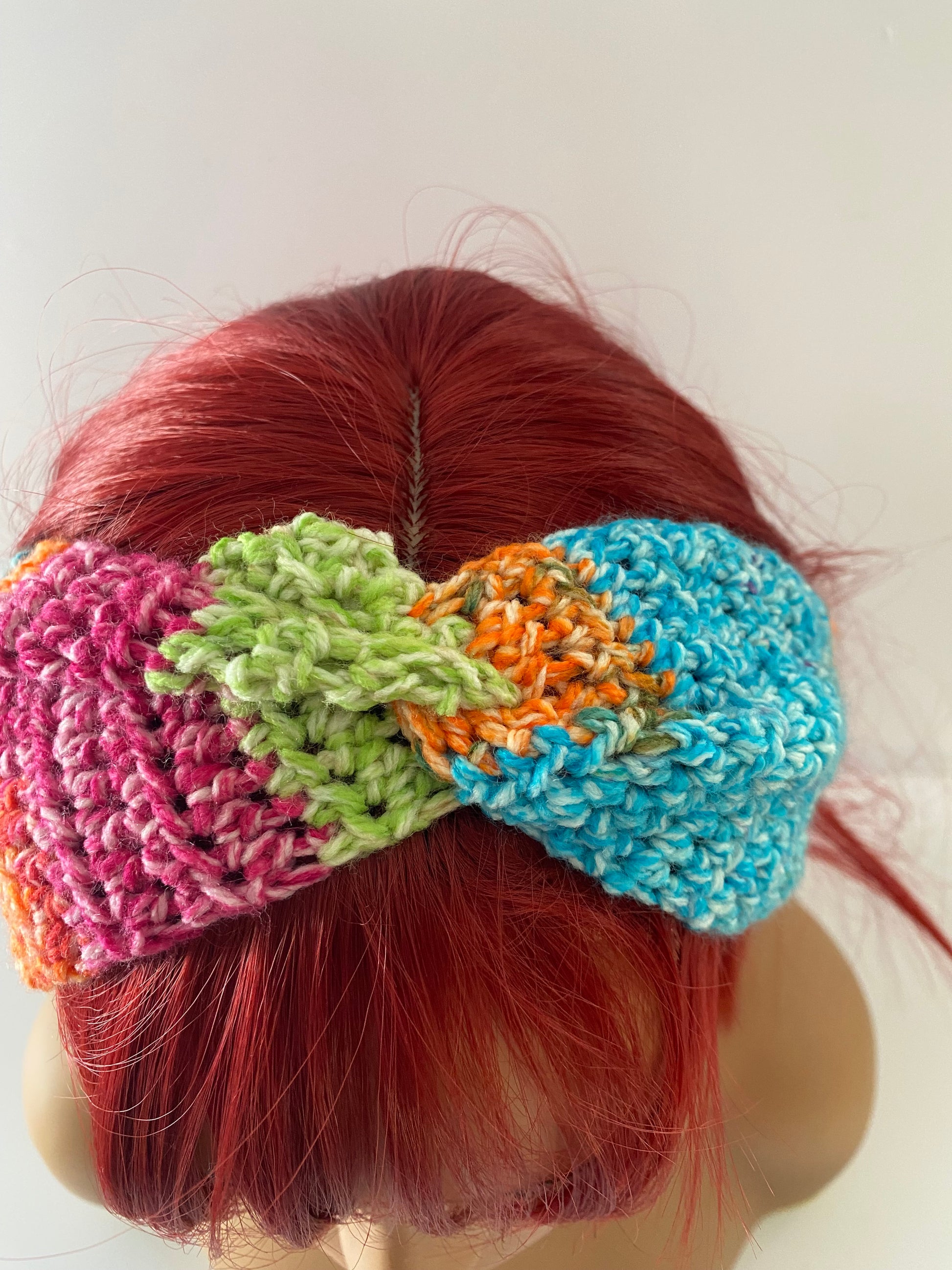 Twisted ear warmer