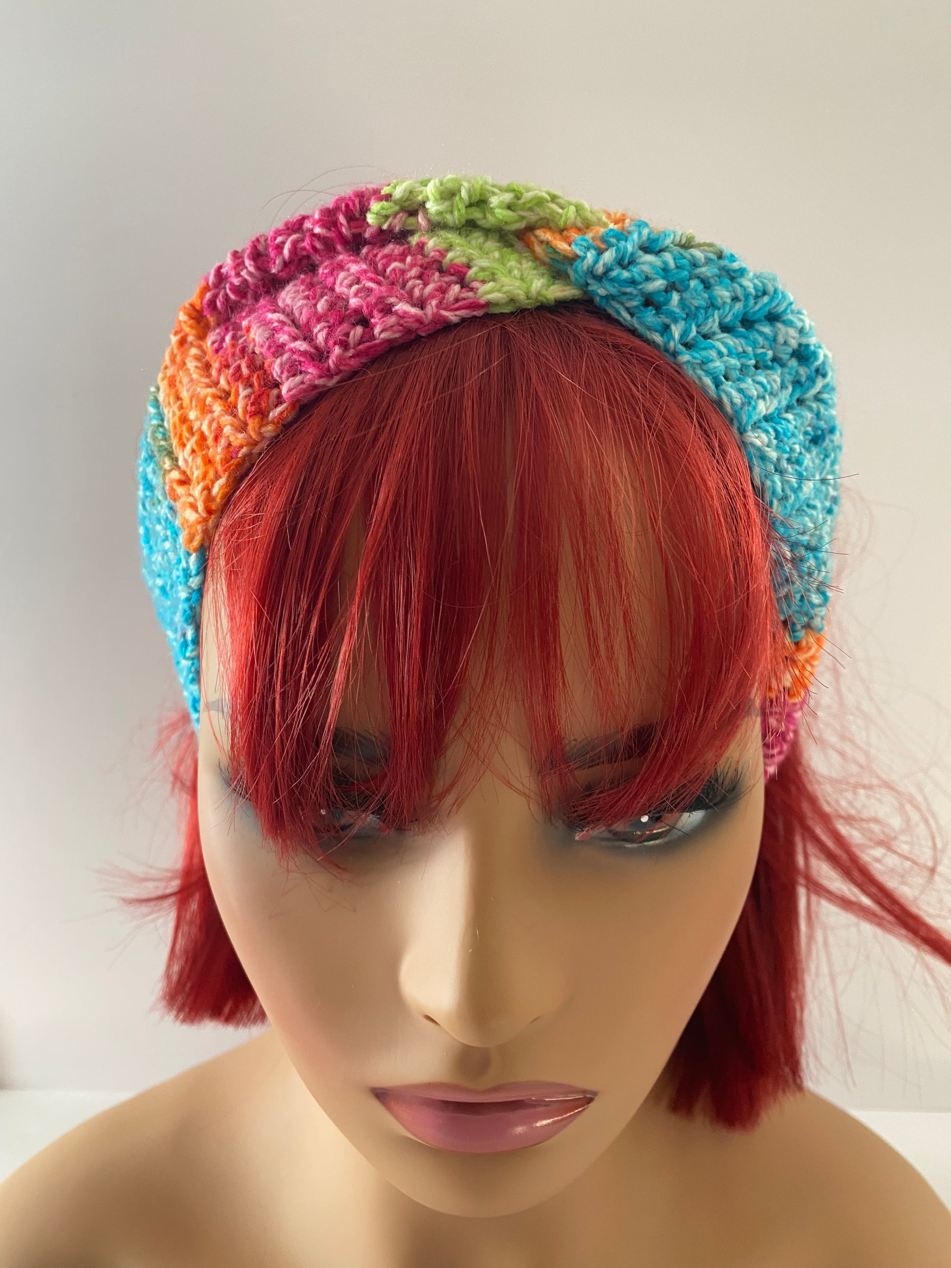 Twisted ear warmer